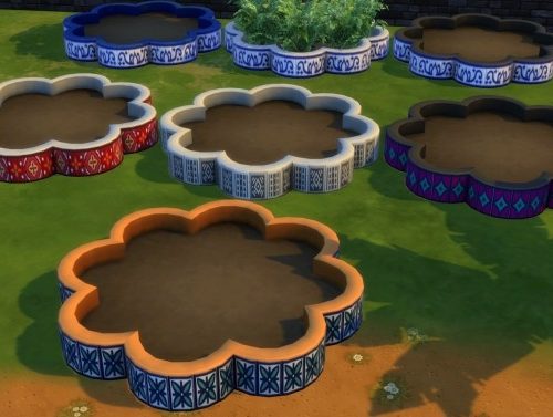 Flower-shaped mosaic planterbox by Serinion at Mod The Sims