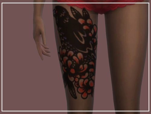 Raven thigh tattoo